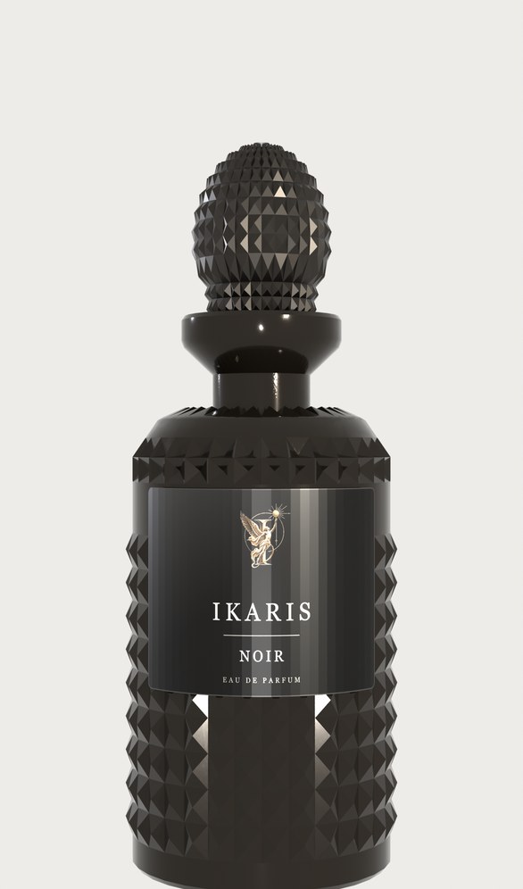 IKARIS Noir eau de parfum bottle in black glass with gold cap, set against dark stone